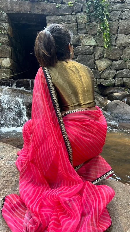 Pink stripped organza saree with black & gold blouse Stylish unclassified dresses